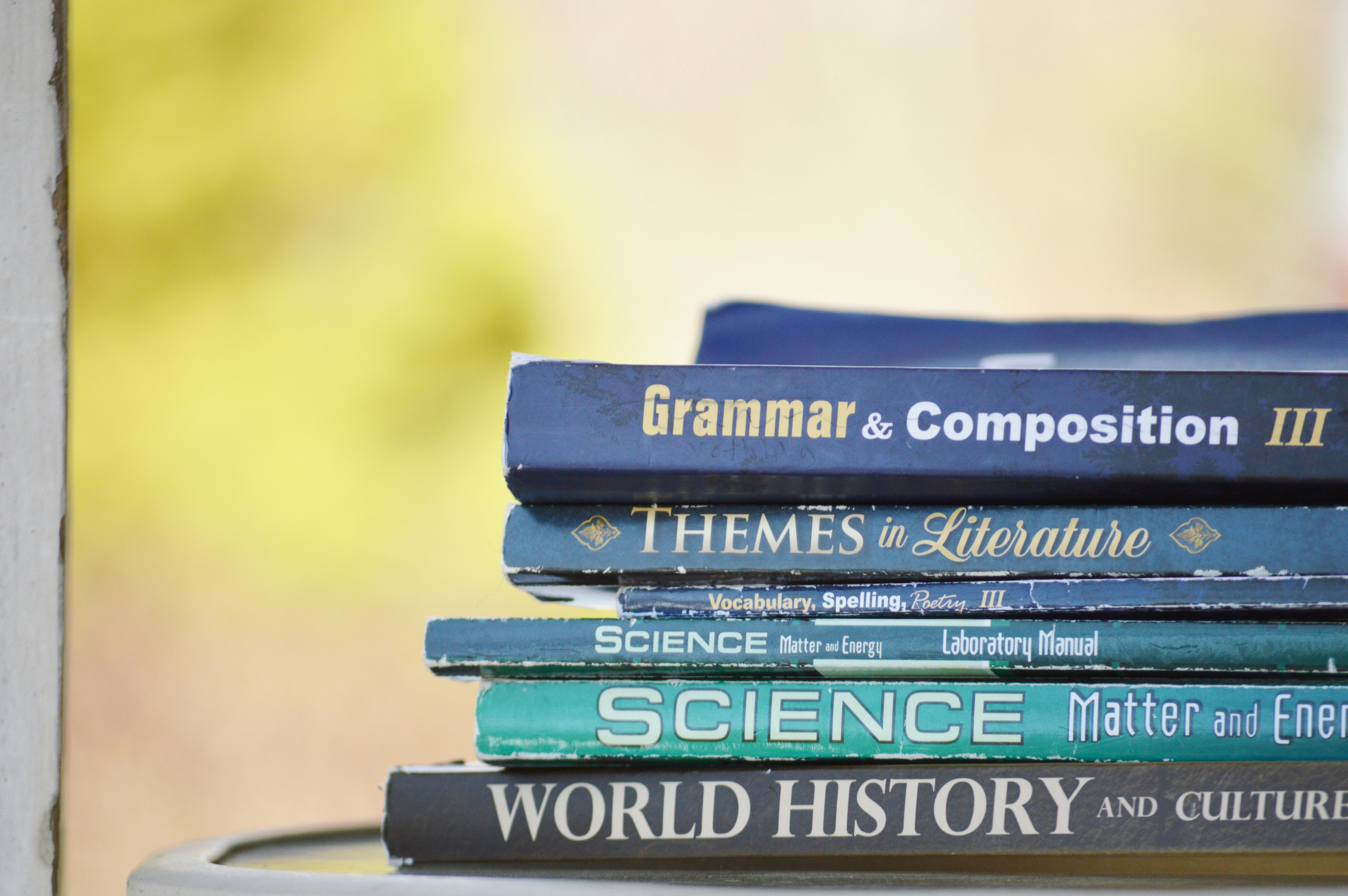 Stack of English grammar and composition textbooks