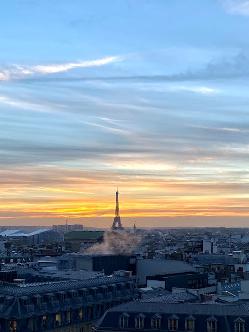 Eiffel Tower and Paris skyline at sunrise
