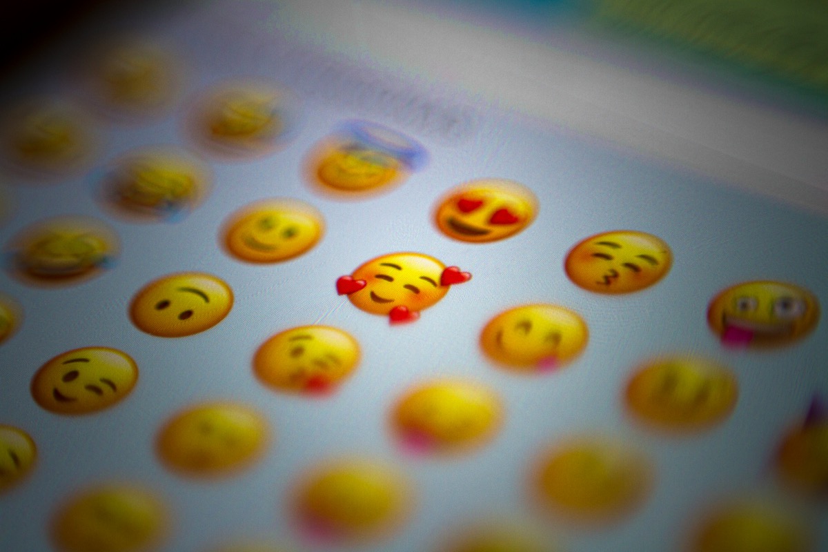 Close-up of emoji on a phone screen