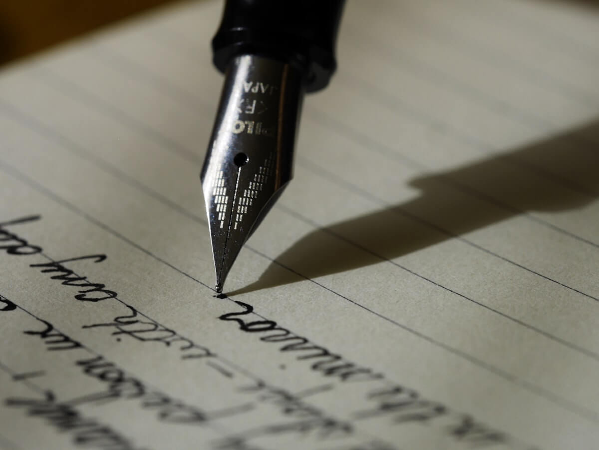 Academic books and journal articles on a desk