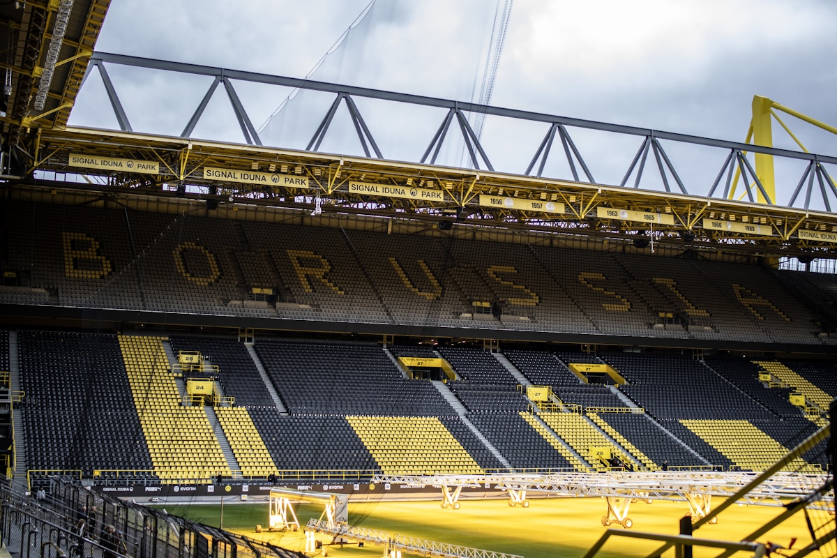 Signal Iduna Park, home of Borussia Dortmund — a club whose name traces back not to Prussian nationalism but to a Borussia brewery sign on the wall of a local pub