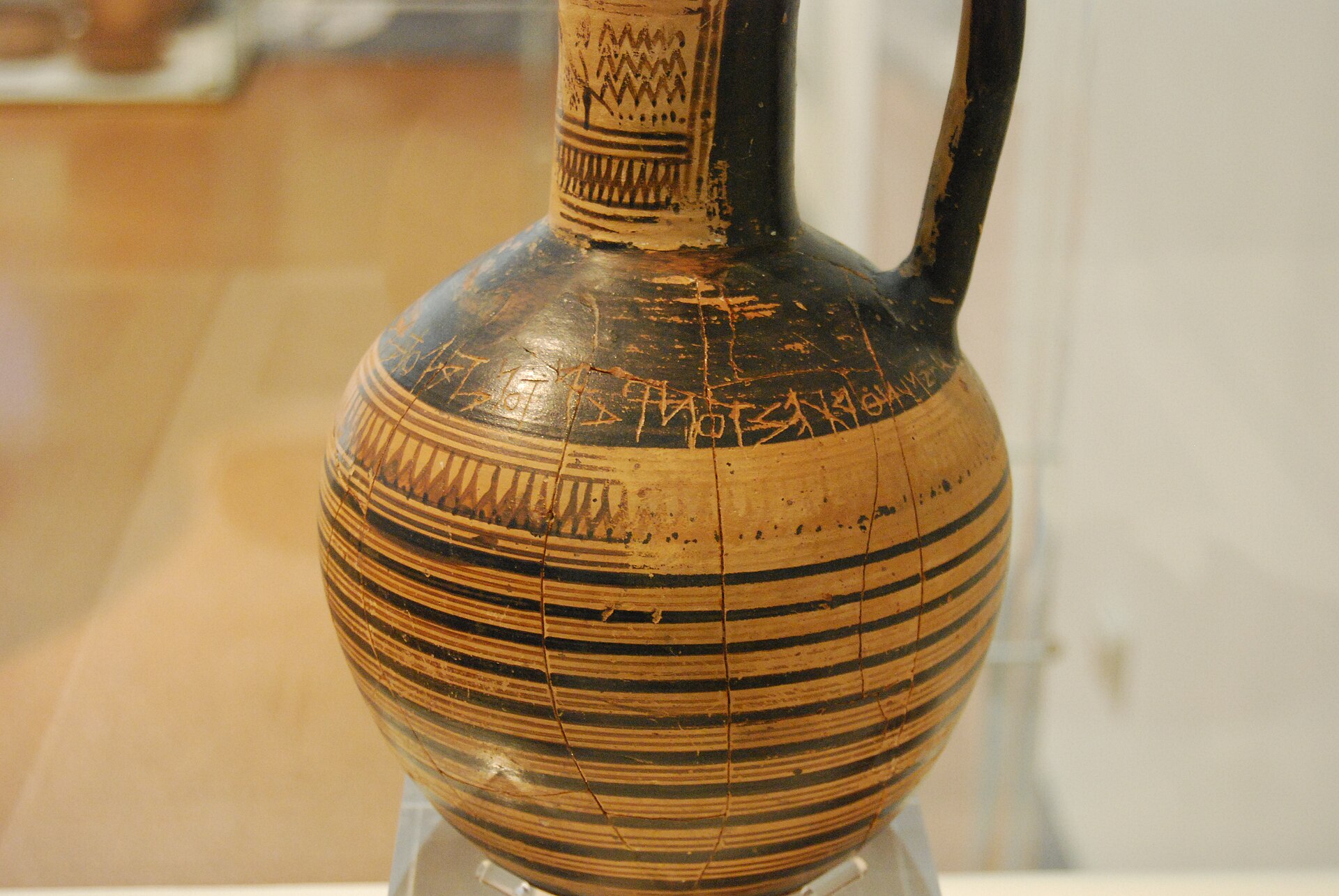 The Dipylon inscription scratched around the shoulder of a Geometric-period wine jug