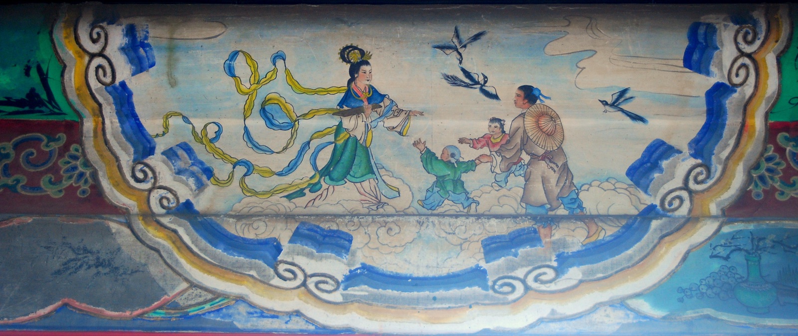 Niulang and Zhinü meeting on the magpie bridge in a Summer Palace corridor painting