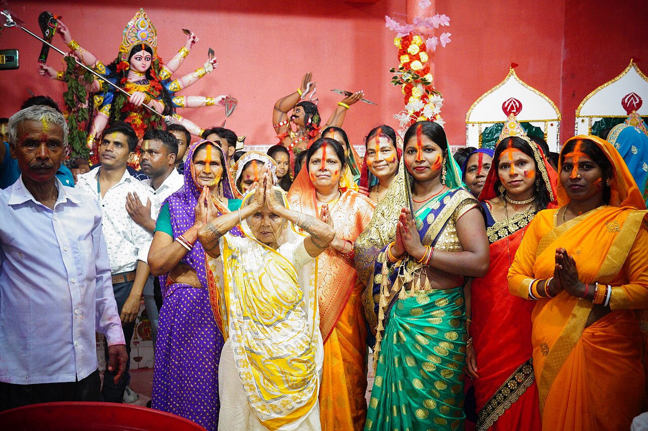 Devotees gathered before a Durga idol during Vijayadashami / Durga Puja celebrations